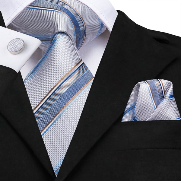 Light blue metallic striped silk tie displayed on a suit