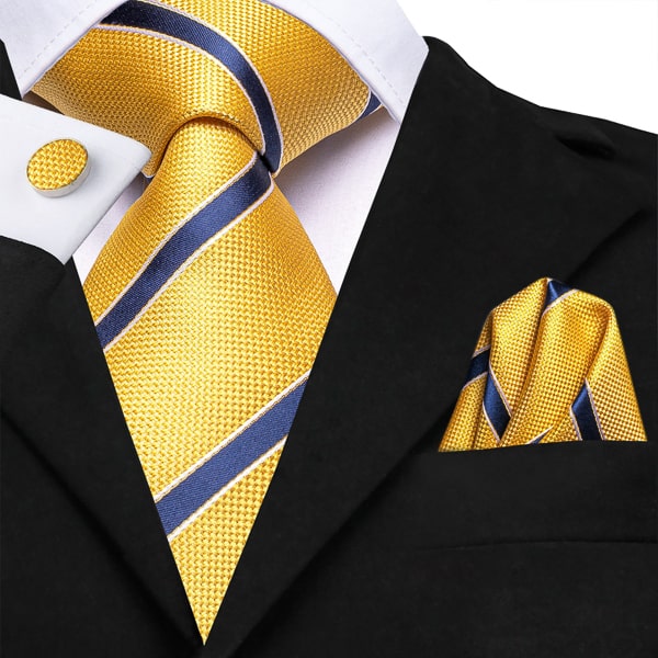 Yellow blue striped silk necktie with matching pocket square and cufflinks on a suit