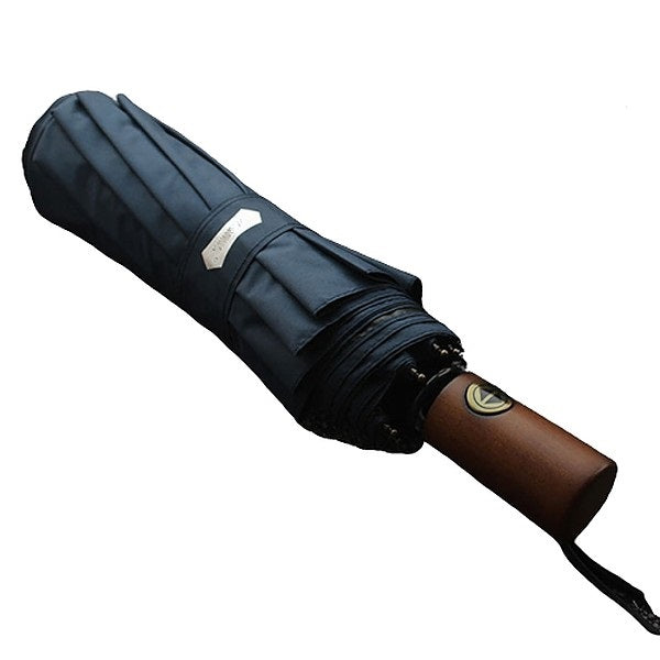 Blue travel umbrella with a wooden handle
