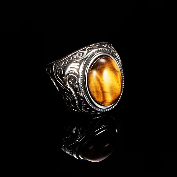 Opal stone ring made of stainless steel on a black background