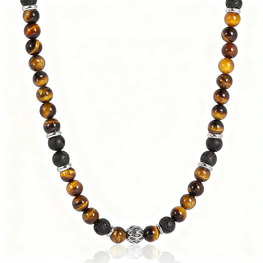Necklace with tiger eye and black stone beads on a white background