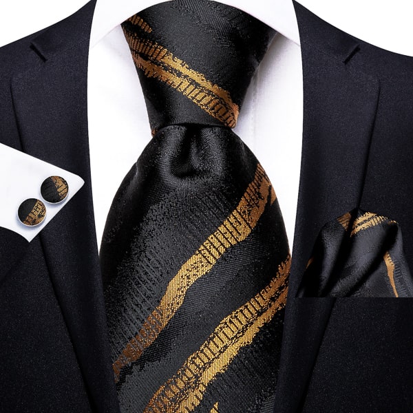 Black gold camouglage striped silk tie displayed on a suit