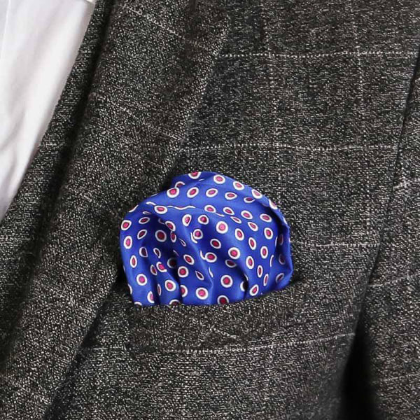 Blue and pink dotted pocket square in suit jacket pocket