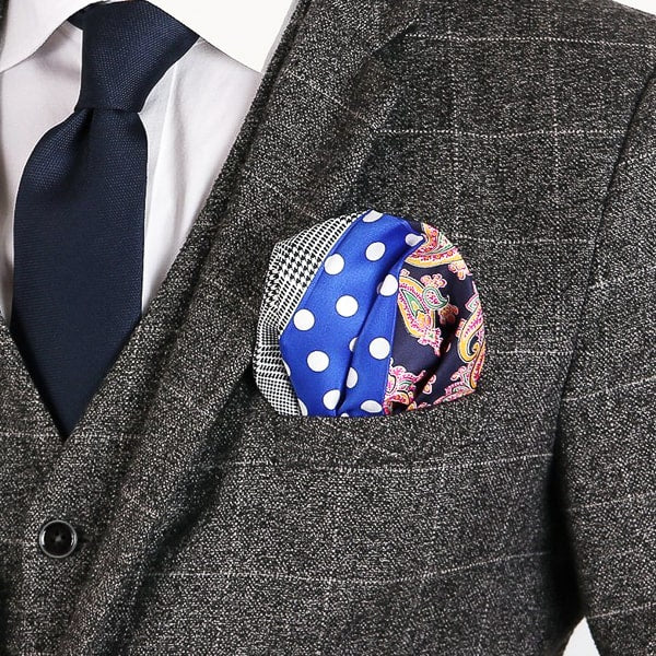 Bright blue multi-pattern pocket square in suit pocket