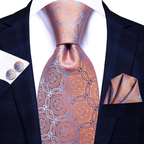 Orange blue circles silk tie displayed on a suit