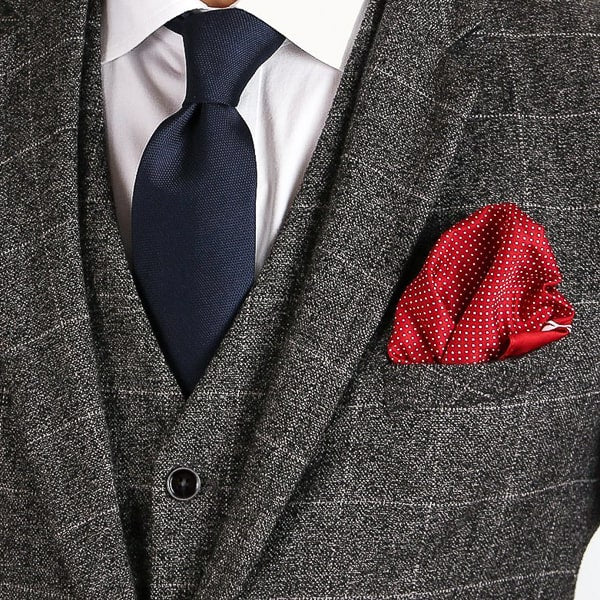 Red micro dot pocket square in suit pocket