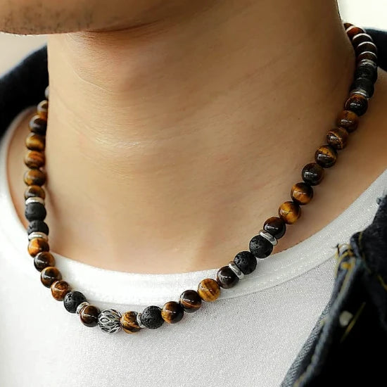 Man wearing a tiger eye stone bead necklace
