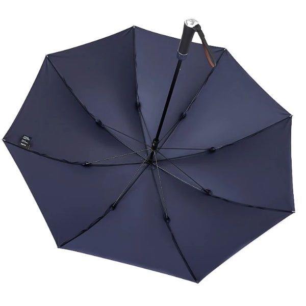 Blue long windproof umbrella upside down