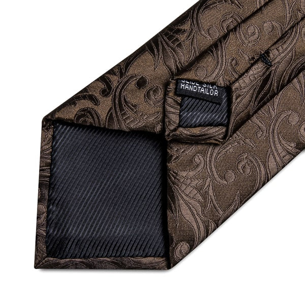 Details of the brown floral silk tie