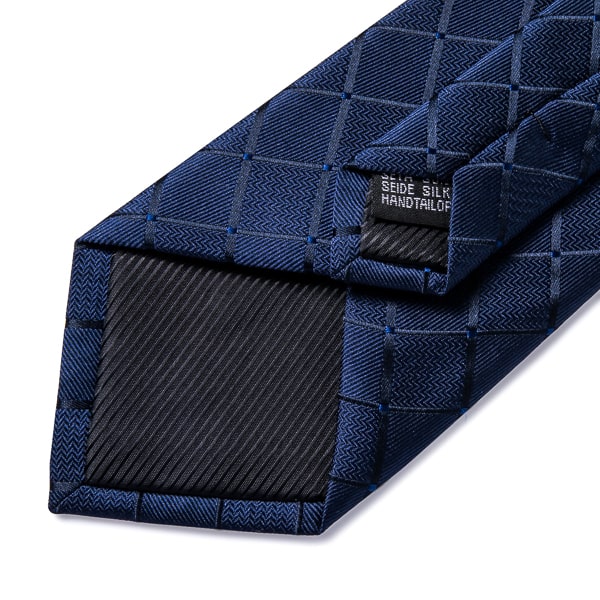 Elegant dark blue silk tie details