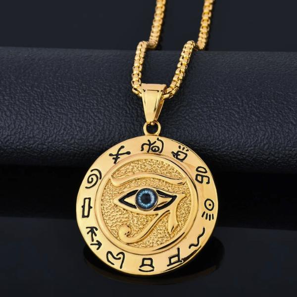 Gold Eye of Horus pendant with hieroglyphs