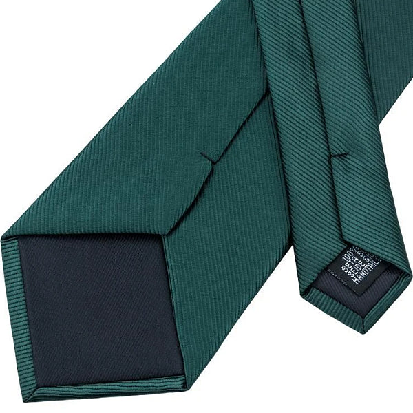 Details of the backside of the jade green silk necktie