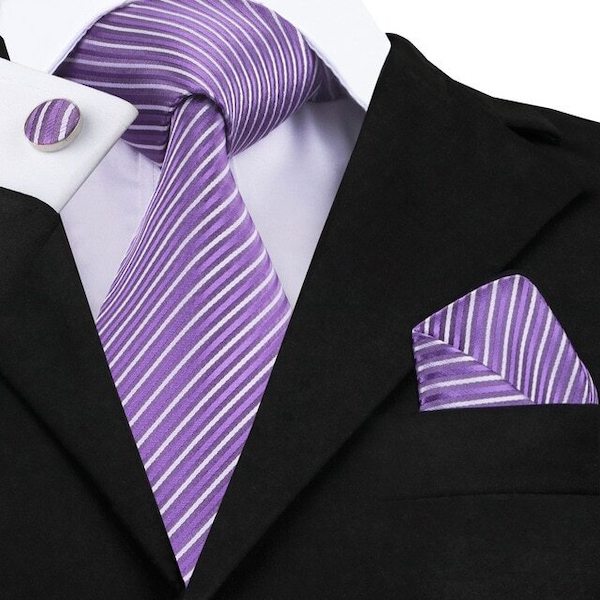 Man wearing a lavender and white striped silk tie set with matching pocket square and cufflinks