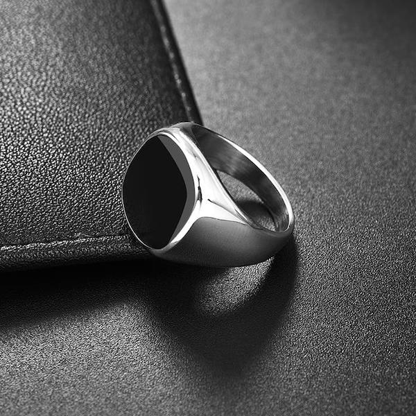 Silver stainless steel ring with round black stone