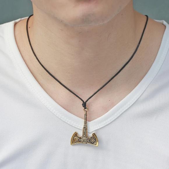 Man Wearing A Gold Axe Pendant Necklace
