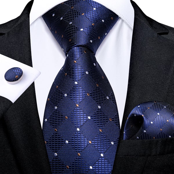 Navy blue silk tie with polka dot pattern