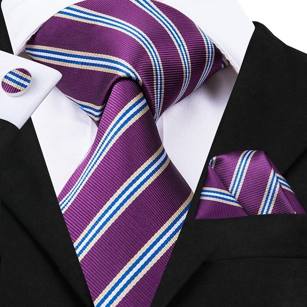 Man wearing a purple striped silk tie set with matching pocket square and cufflinks
