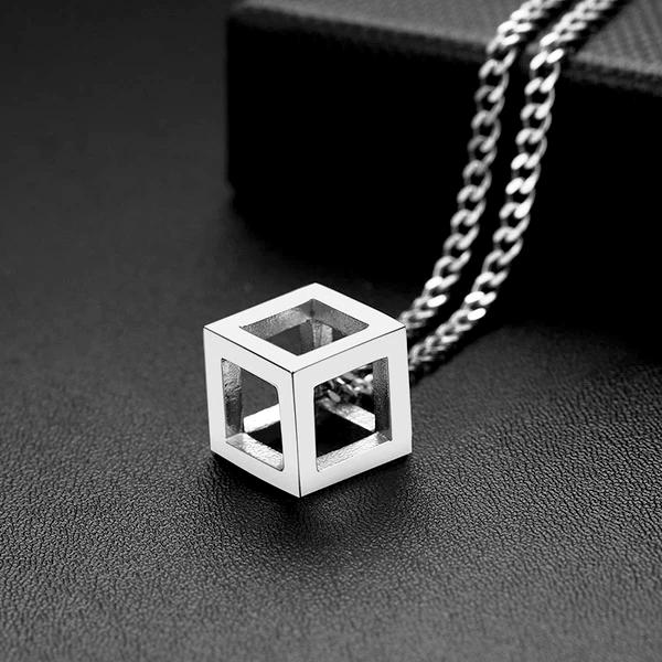 Silver cube pendant on a silver curb chain
