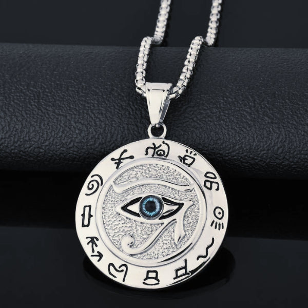 Silver Eye of Horus pendant with hieroglyphs