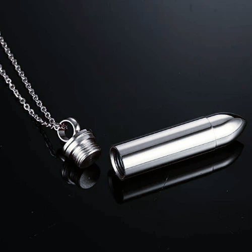 Silver bullet pendant with openable container for ashes