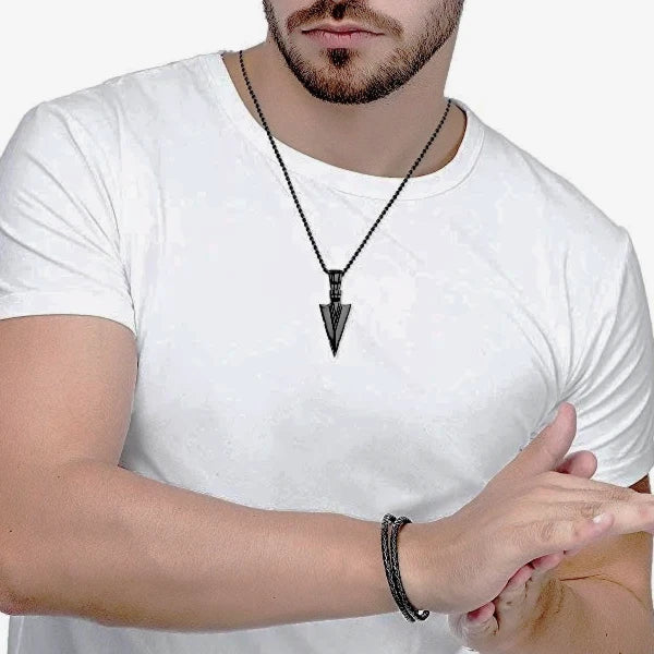 Man Wearing A Black Arrowhead Pendant Necklace