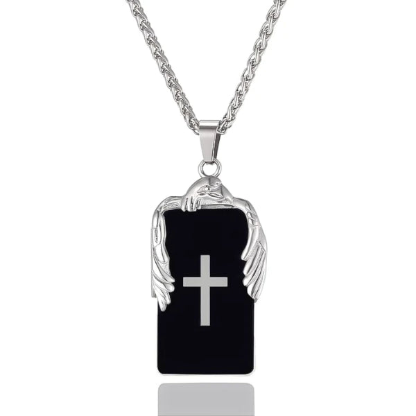 black plate pendant with a cross and silver eagle on top