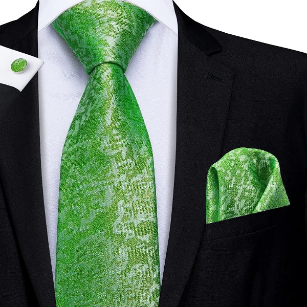Lime green camouflage tie set displayed on a suit