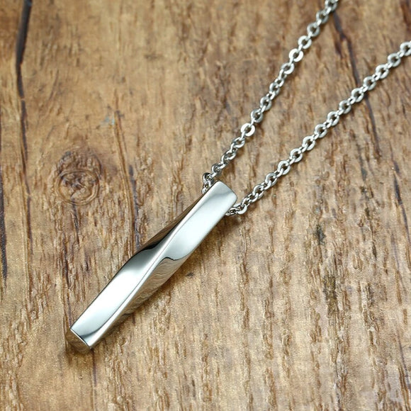 Silver twisted bar pendant necklace in a closeup photo