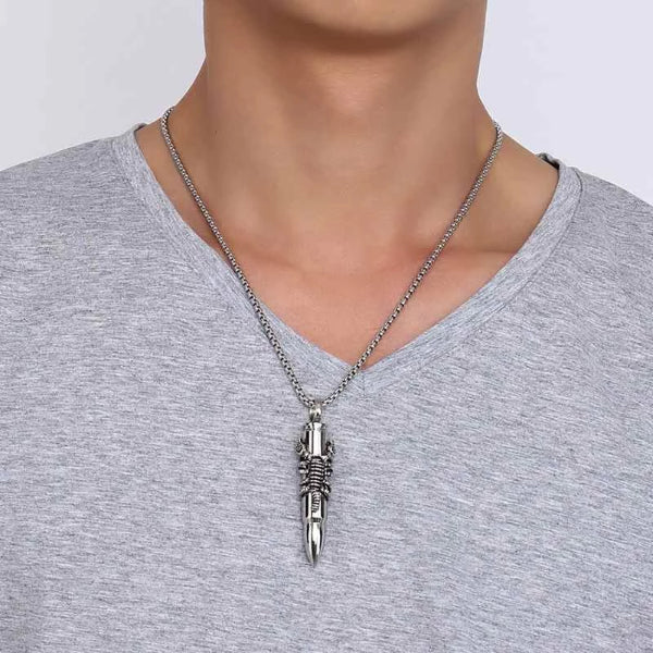 Man wearing a scorpion bullet pendant necklace