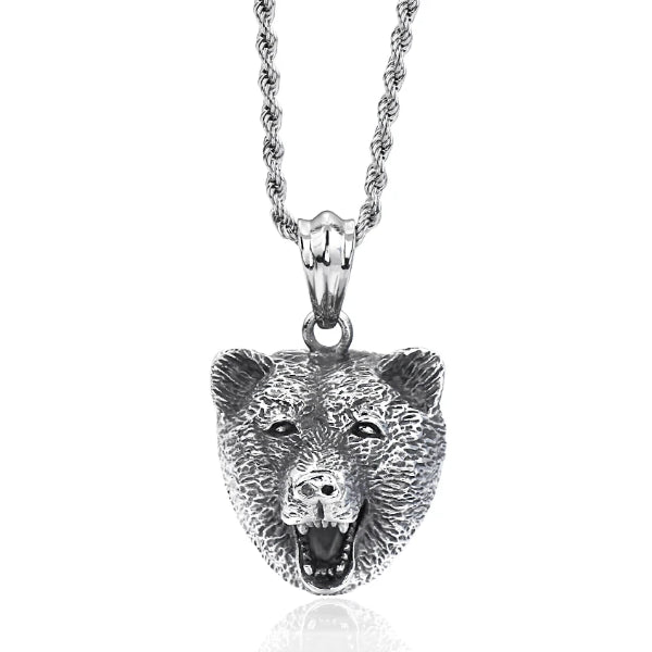 Silver bear head pendant hanging on a necklace